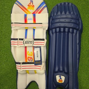 Front face and inner padded back view of EM 360 PLAY BURST adult navy blue cricket batting pads on artificial grass on Alberta.