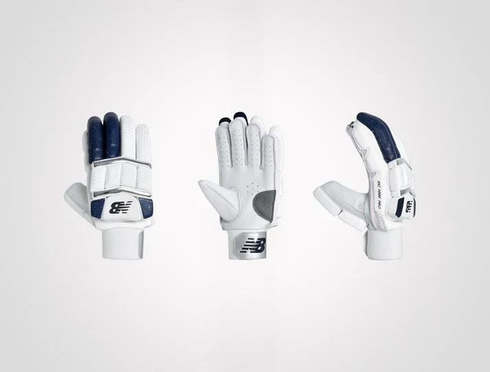 Multiple angles of the New Balance DC 10i Pro adult cricket batting gloves showing front, palm, and side views on albertacrickets.com.